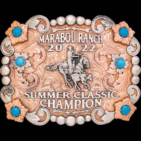 The Colorado Springs Belt Buckle is a beautiful copper trophy buckle embellished with copper flowers, silver beads and turquoise stones. Customize it for the next rodeo champion!